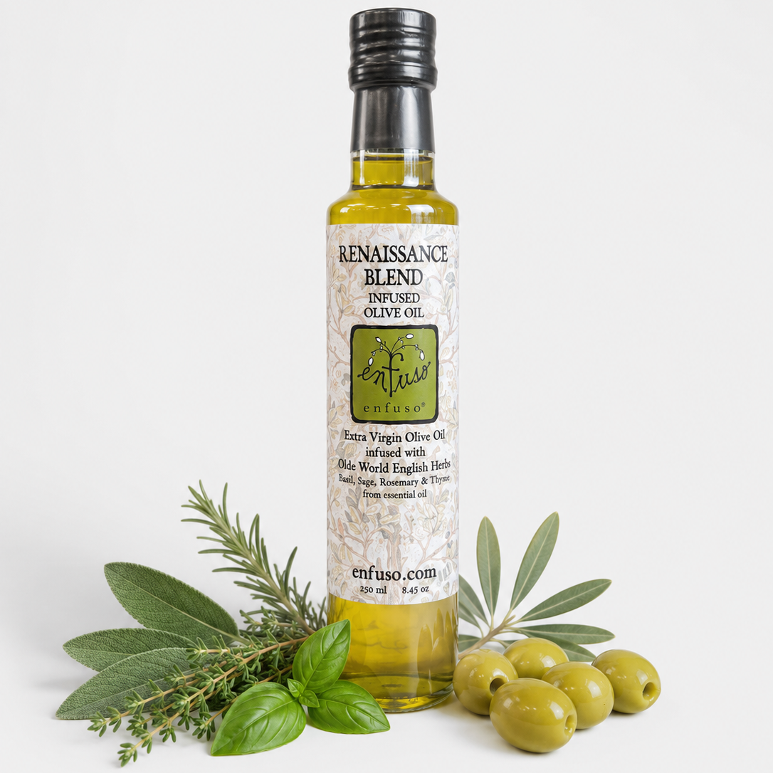 Bottle of Renaissance Blend olive oil with olives and rosemary on a white background